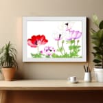 Vintage floral wall art with red, purple & white flowers, green leaves, and a black frame on a white background. displayed on the wall