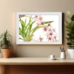 Infidu Vintage Orchid Floral Wall Art with white, pink, and purple orchids, yellow centers, and green leaves on a white background. displayed on the wall in a white frame