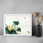 Infidu vintage wall art featuring a detailed botanical design with green leaves, bright yellow flowers, and a delicate dragonfly hovering above, set against a light background. displayed on the wall art in a white frame