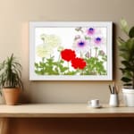 Vintage floral wall art with yellow, red, and purple flowers and green leaves on a white background. displayed on the wall