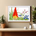 Infidu Vintage Botanical Wall Art with red, yellow, pink, and blue flowers, green leaves, and white background, creating a fresh and elegant look. displayed on the wall in a white frame