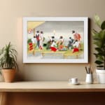 Vintage Japanese wall art with geishas in a tea ceremony, featuring red, white, black, and green tones in a serene outdoor setting with a white frame. displayed on the wall