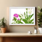 Infidu vintage wall art with delicate white and pink flowers, green leaves, and a black frame on a white background for a timeless botanical look. displayed on the wall art in a white frame