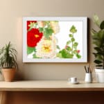 Infidu vintage wall art with red, white, and yellow flowers, green leaves, and a black frame on a white background for a timeless botanical look. displayed on the wall art in a white frame