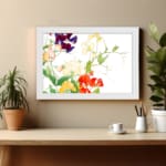 Infidu vintage wall art with red, yellow, purple, and white flowers, green leaves, and a white frame on a white background for an elegant look. displayed on the wall