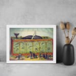 Vintage wall art of a whale exhibition featuring a large whale in a glass enclosure with spectators in classic attire and a nostalgic setting. displayed on the wall in a white frame