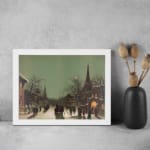 Infidu vintage wall art featuring a winter city scene with snowy streets, people walking, horse-drawn carriages, and warm golden lights from historic buildings, creating a cozy, old-fashioned atmosphere. displayed on the wall art in a white frame