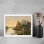Dreamy vintage river landscape with deer, two castles, and a golden sky in a peaceful fairytale setting. displayed on the wall in a white frame