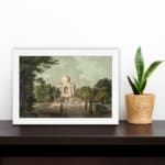Infidu vintage wall art featuring the Taj Mahal with earthy tones of green, beige, and brown, framed by lush trees and a long pathway leading to the monument. displayed on the wall art in a black frame