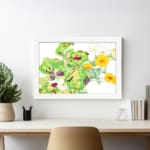 Vintage floral wall art with yellow flowers, green leaves, and a white frame on a white background. displayed on the wall