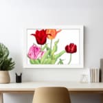 Vintage floral wall art with red, pink, and orange tulips, green leaves, and a white frame on a white background. displayed on the wall