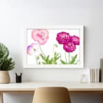 Vintage floral wall art featuring pink and purple flowers with green leaves, set against a white background with a white frame. displayed on the wall