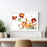 Vintage floral wall art with red, yellow, and orange flowers, green leaves, and a white frame on a white background. displayed on the wall