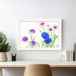 Infidu Vintage Floral Wall Art with blue, purple, and white flowers, green stems, and a white frame on a light background. displayed on the wall
