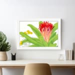 Infidu Vintage Botanical Wall Art with red, orange, and yellow flowers, green leaves, and a white frame on a white background. displayed on the wall