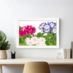 Vintage floral wall art with pink, white, and blue flowers surrounded by green leaves on a white background, framed in white for an elegant look. displayed on the wall