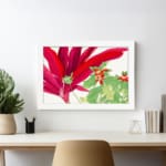 Infidu Vintage Floral Wall Art with large red leaves, green leaves with red accents, and a white frame on a white background. displayed on the wall.