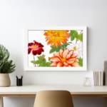 Vintage floral wall art with large orange, red, and white flowers, green leaves, and a white frame on a white background. displayed on the wall