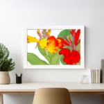 Vintage floral wall art with bright yellow and red flowers, green leaves, and a white background in a classic design. displayed on the wall
