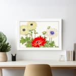 Vintage floral wall art with cream and red flowers, green leaves, and a white background in a classic design. displayed on the wall in a white frame