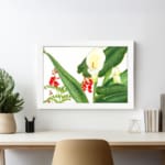 Infidu vintage wall art with white calla lilies, red flowers, and green leaves on a white background, framed in white for a classic and stylish look. displayed on the wall