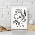 Infidu vintage wall art featuring two horses in black and white ink with bold brushstrokes, creating a timeless and dynamic design. displayed on the wall art in a white frame