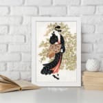 Vintage wall art of a Japanese woman in a black kimono holding a fan, with delicate trees in the background. displayed on the wall in a white frame