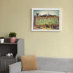 Vintage wall art of a whale exhibition featuring a large whale in a glass enclosure with spectators in classic attire and a nostalgic setting. displayed on the wall in a white frame