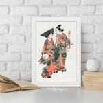 Two figures in traditional Japanese kimonos with orange, green, and black patterns standing gracefully on a plain white background. displayed on the wall in a white frame