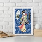 Japanese woman in colorful kimono with calligraphy background, vintage art style displayed on the wall in a white frame
