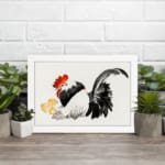 Infidu vintage wall art featuring a traditional-style rooster with two little chicks, set against a white background with bold black, white, red, and yellow tones. displayed on the wall art in a white frame
