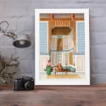 Vintage architectural wall art with historic figures, blue and gold tones, and a white frame for a classic and elegant look. displayed on the wall