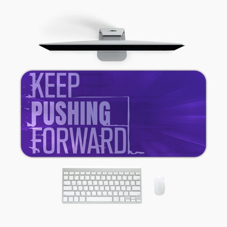 Infidu desk pad with bold “Keep Pushing Forward” quote on purple background and vintage art-inspired design.