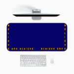 Infidu blue desk pad with “Believe and Achieve” quote in bold orange text on a deep blue background.
