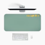 Infidu muted green desk pad with bold yellow “YOU CAN DO IT” quote.