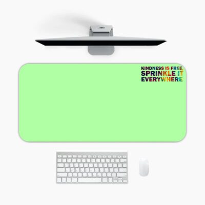 Infidu mint green desk pad with colorful “Kindness is free” quote and playful vintage-style design.