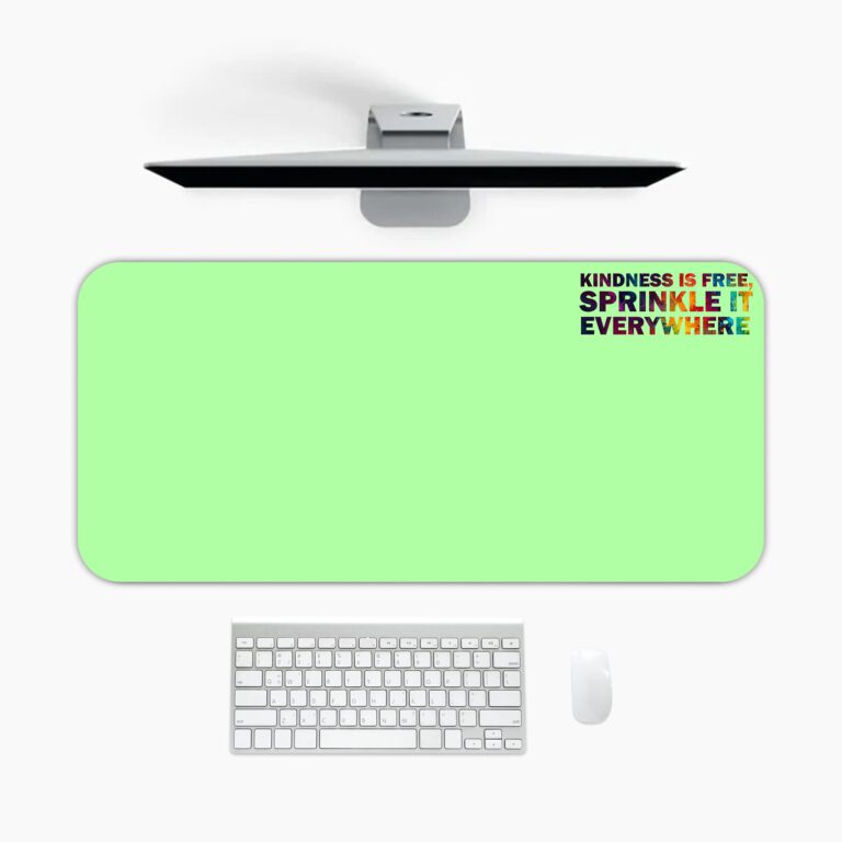 Infidu mint green desk pad with colorful “Kindness is free” quote and playful vintage-style design.