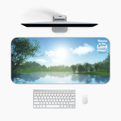 Infidu Calm Nature Desk Pad featuring a serene lake, green trees, and Philippians 4:4 Bible verse in white and light blue fonts.