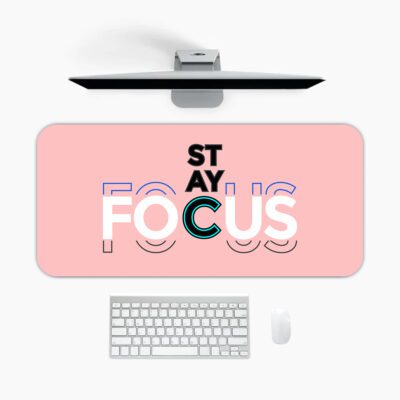 Infidu pastel pink desk pad with bold “STAY FOCUS” quote in colorful typography