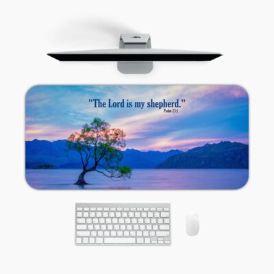 Scenic desk pad with Bible verse and serene lake, tree, and pastel sky design.