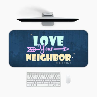 Infidu navy desk pad with “Love Your Neighbor” Bible verse in colorful vintage lettering on a textured blue background.