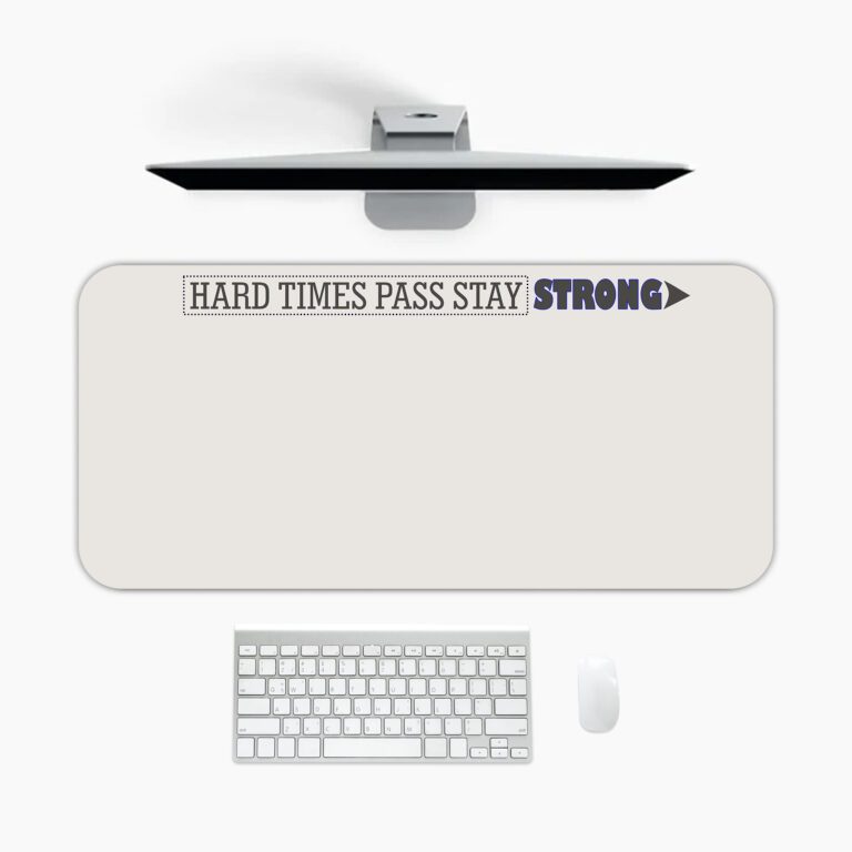 Infidu beige desk pad with motivational quote "HARD TIMES PASS STAY STRONG" and bold purple accent on a clean white background