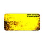 Infidu bold yellow desk pad with black grunge edges and motivational quote “STOP THINKING START DOING” in a vintage art style.