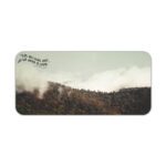 Infidu Misty Mountain Desk Pad featuring forested hills with fog, earthy colors, and the inspirational quote "Live as love did, and be made in love."
