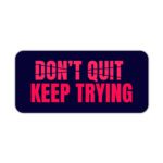 Infidu dark blue desk pad with bold red “DON’T QUIT, KEEP TRYING” motivational quote in the center.