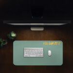 Infidu muted green desk pad with bold yellow “YOU CAN DO IT” quote.