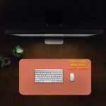 Infidu terracotta desk pad with bold motivational quote in yellow and red on warm orange background, minimalistic vintage art design.