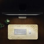 Infidu beige desk pad with green leaves and Bible verse from Proverbs 19:21