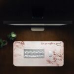 Infidu pink floral desk pad featuring Mark 12:31 scripture with delicate flower illustrations and a soft gradient pink background.