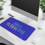 Infidu royal blue desk pad with “Stay Positive” quote in colorful pastel font and marble texture background.